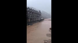 Buildings damaged as floodwater tears through village in western Poland