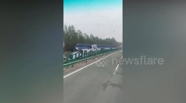 Dozens of brand-new electric cars written off after transporter overturns