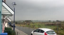 UK Weather (Uncensored version) Lightning strike hits Art festival Participant. Nansledan Newquay Cornwall UKin Royal town of Nansledan Cornwall UK