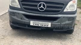 Gaffer Tape Gaff, Cheeky campers block their number plates at Cornish beauty spot. Towan Headland, Cornwall, UK