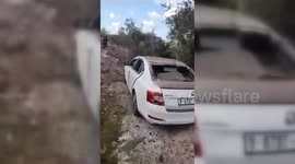 Palestine: Fragments of the Israeli Iron Dome fall in the west Bank village of Dair Istia in Selfit