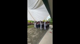 Office party see staff play hilarious human caterpillar game