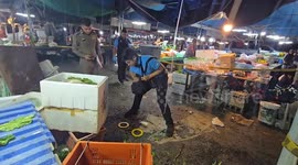 Market owner shoots at ex-business partner and injures bystander in gun rampage