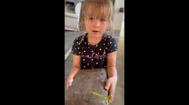 Girl Makes Friends With Praying Mantis