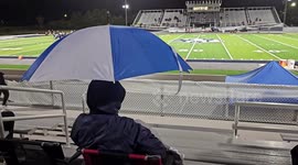 Football Fans Braving Inclement Weather