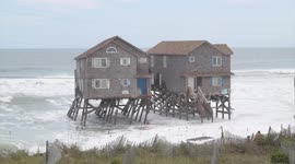 Beach homes topple into Atlantic after erosion and storms