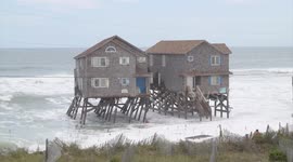 Beach homes topple into Atlantic after erosion and storms