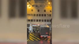 Ramp onto Calais ferry rises in air with lorry on top
