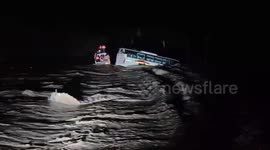 Dramatic footage shows NDRF rescue of  all 29 pilgrims from bus stranded in flood water near Bhavnagar , Gujrat