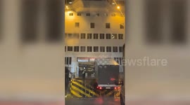 Ramp onto Calais ferry rises in air with lorry on top