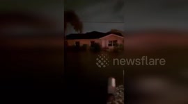 US: Bonita Springs Under Siege: Firefighters Navigate Flooded Streets Amidst Hurricane Helene's Surge