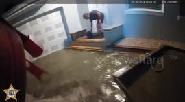 Body cam video: LCSO rescues man from rising flood water on Fort Myers Beach