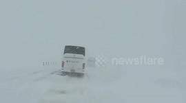 Chaos as sudden snowstorm blankets Inner Mongolia, leaving hundreds of motorists trapped on highway