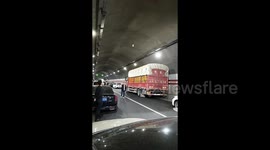 Frustrated drivers turn tunnel into impromptu badminton court during national day holiday gridlock in China