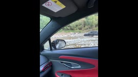 SUV crashes into couple's car by riverbank in Shaanxi Province, China