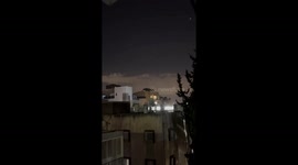 Footage shows dozens of Iranian missiles flying over Israel's Holon