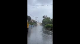 Electrician fixes power lines while typhoon batters Taiwan
