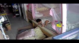 Toddler throws pillows off bed, using them to safely climb off bed