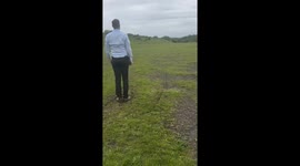 Dad quickly pulls child off bike to prevent crash in South Wales, UK