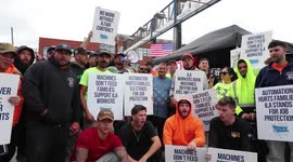 U.S. port workers on massive strike for wages, automation