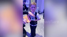 Boy, 5, takes polaroids for £2 a pop to raise money for school defibrillator