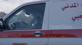 Refugees in Beirut surround car to collect mattresses as Israel launch strikes on Lebanon