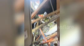 Grandmother's bedroom destroyed by Hurricane Helene - leaving only Bible untouched