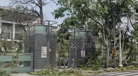 Typhoon Krathon impacts Taiwan: Severe disaster in southern Taiwan. Numerous roadside trees were uprooted by strong winds. The video shows post-disaster recovery efforts underway