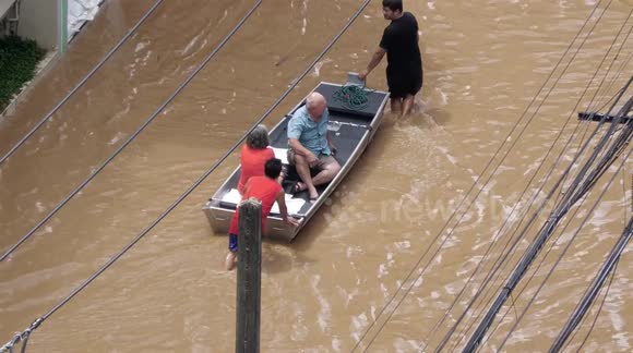 The Ping River in Chiang Mai flooded overnight,causing tourists and locals to be evacuated from the hardest- hit areas