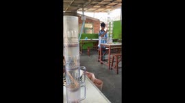 Glass tower balancing act in Cimahi, Indonesia