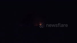 Syrian air defenses respond to Israeli attack in central region: media