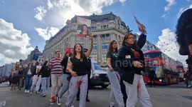 Women wearing bloodied sweatpants march through Central London on the first anniversary of the October 7th attacks in Israel