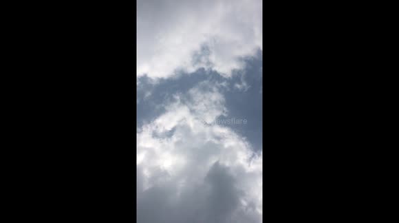 An Angel with wings in the clouds? Uk.