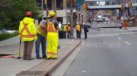 Massive sinkhole opens on road in Canada