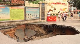 Sinkhole opens in front of a primary school in China