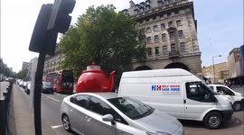 Giant Teapot Rides Down London Street