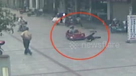 Elderly lady gets knocked over by electric toy car