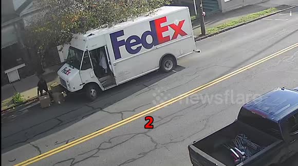 Clumsy FedEx driver drops package several times cracking camera lens inside