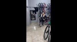 Mother attempts to ride bicycle after years, takes a tumble