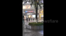 China: Some People Dancing in Rain