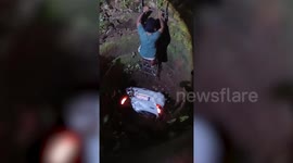 Couple plunges into well after car veers off road in southern India, fire brigade rescues them