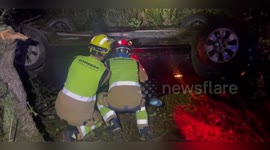 Spain: Firefighters Save Driver After Car Goes Off-Road in La Vall d'Alba