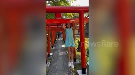Former professional gymnast sparks outrage by doing pull-ups on sacred Japanese gate