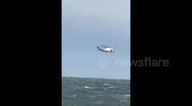 Fisherman rescued by helicopter from boat on verge of sinking off China's east coast