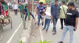Street sweepers clean the streets in Dhaka, Bangladesh