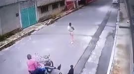 Mexico: Shocking Moment Biker Crashes Into Mother And Baby Walking In Road