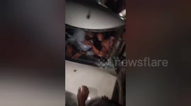India: Passengers in the car narrowly escaped in a fierce collision between a car and a truck, the roof of the car damaged, the local people pulled out the passengers in Orisha