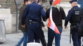 Police arrest a man disturbing a rally for a ceasefire in Lebanon, “against Iranian takeover and for the application of resolutions 1701 1559 1680”. Paris, Place du Pantheon. 20 oct 2024