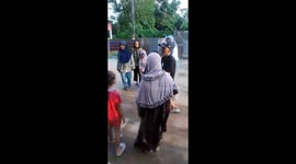 Child rescued from gutter in Indonesia