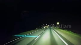 Russia: Lightning Reactions Of Driver As He Weaves Between Elks On The Road